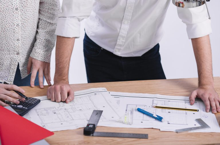 Draft house plans being reviewed